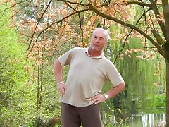 Young amateur girl meets an older man in the local park
